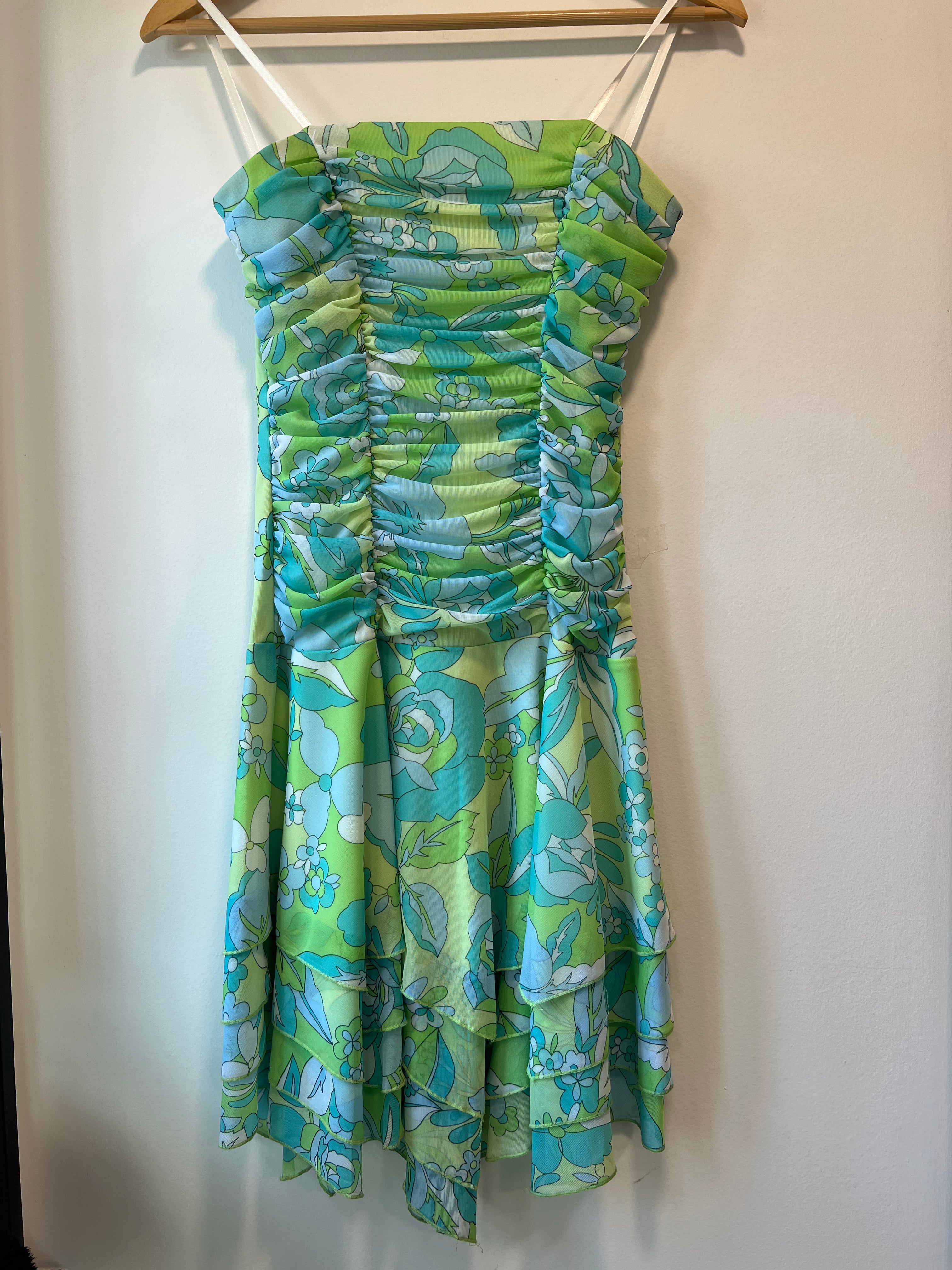 City of triangles green dress