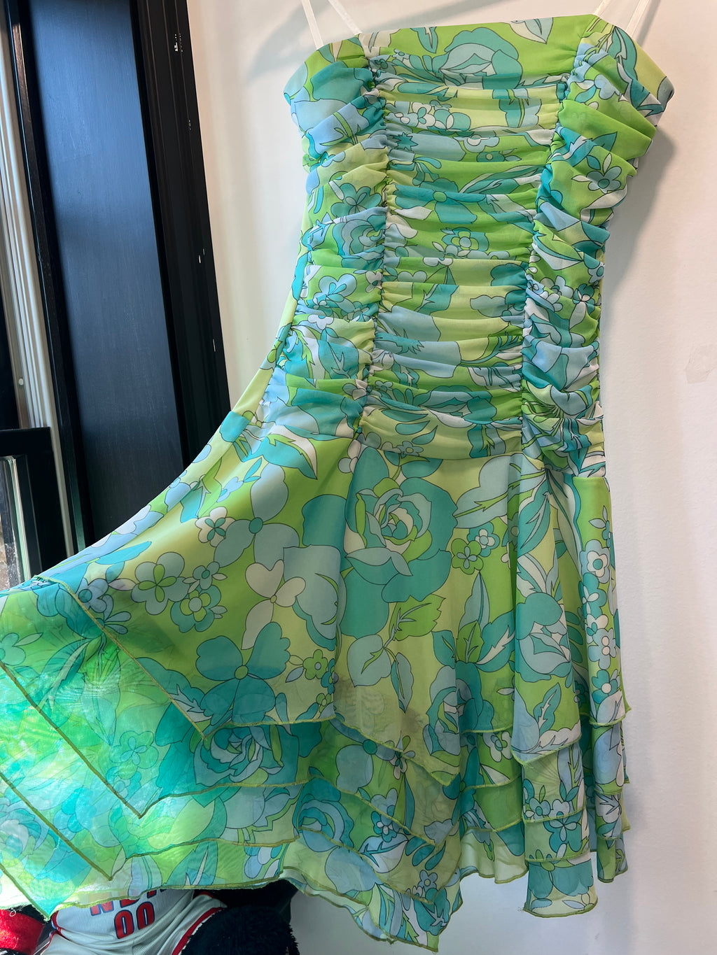 City of triangles green dress